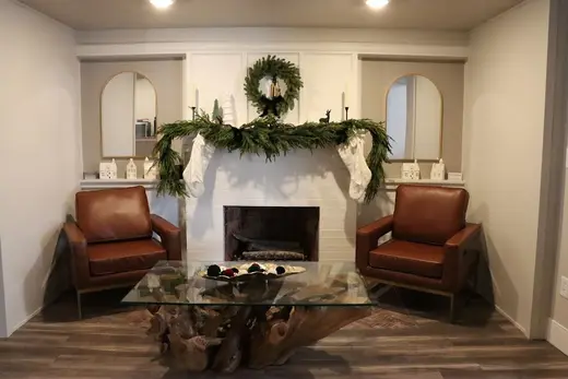Cozy living room with leather chairs at Radix Recovery detox center in Iowa.
